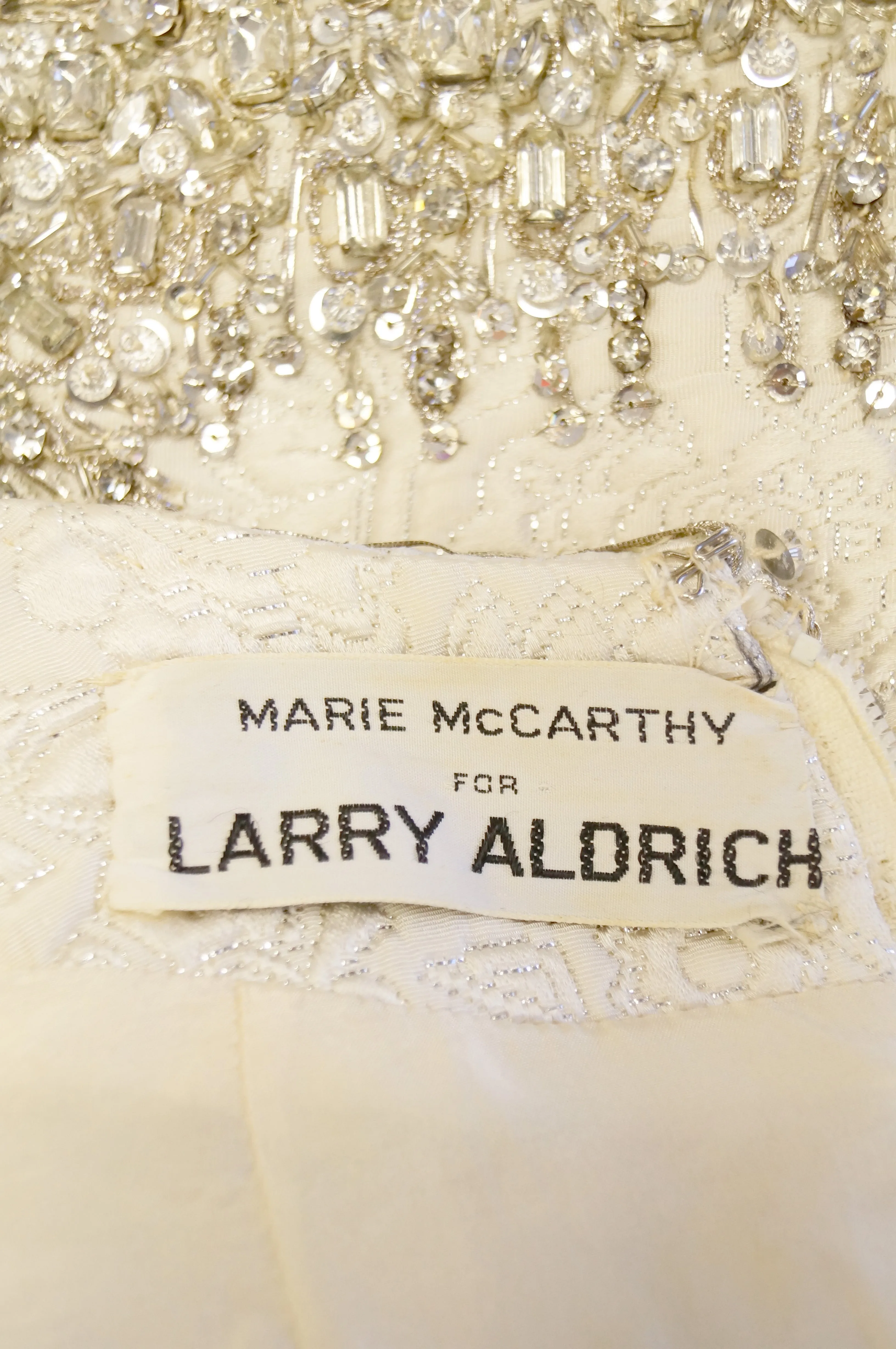 1960s Marie McCarthy for Larry Aldrich Ivory and Silver Sequin Evening Dress
