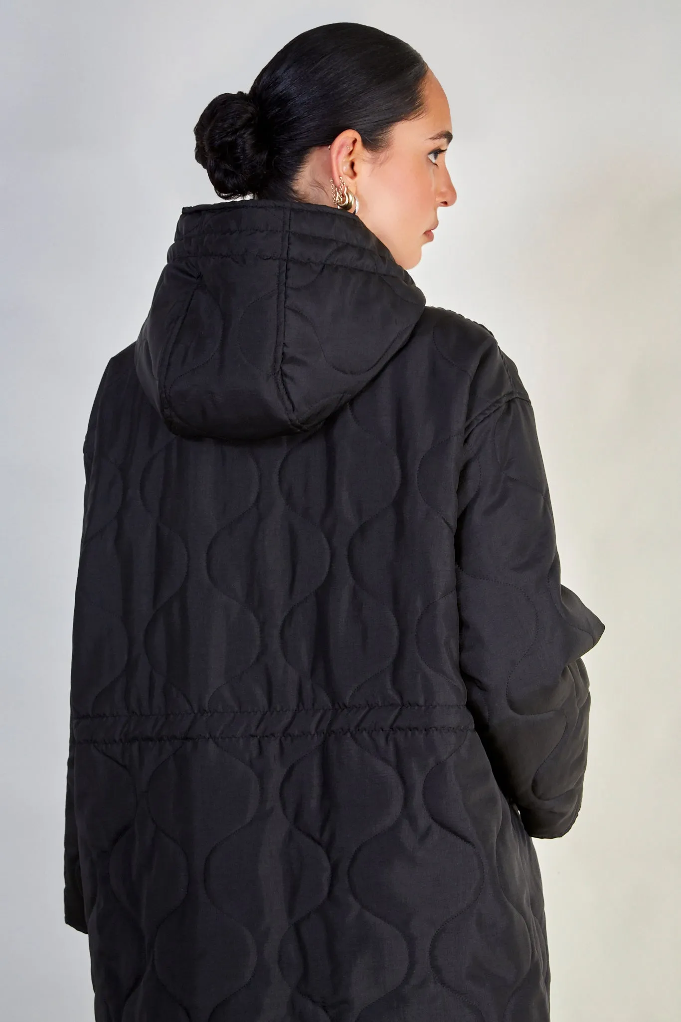 Black long rounded quilt jacket