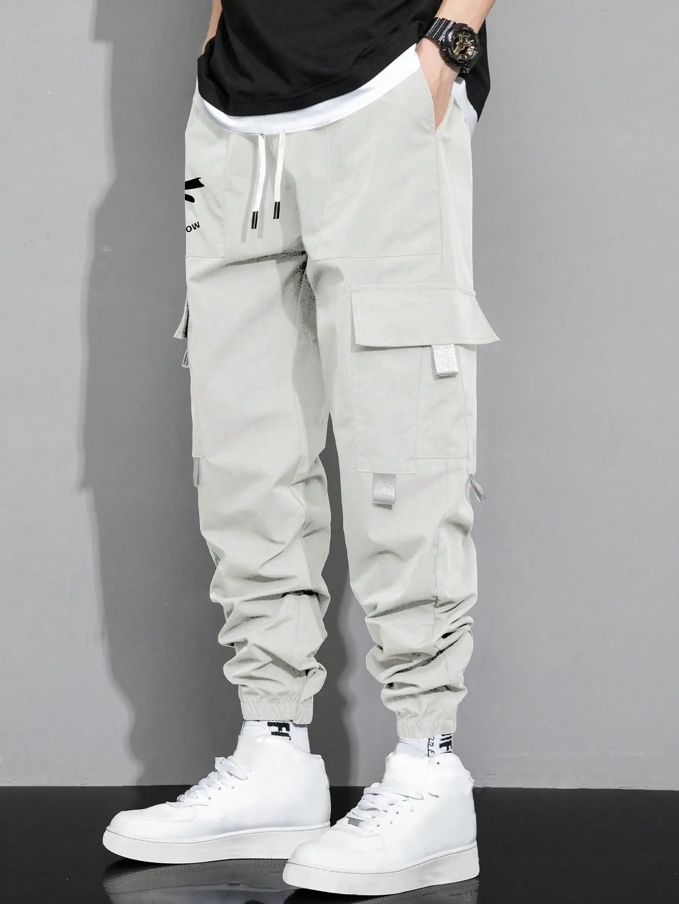 Manfinity Hypemode Loose Fit Men's Cargo Pants With Letter Graphic, Flap Pockets And Drawstring Waist